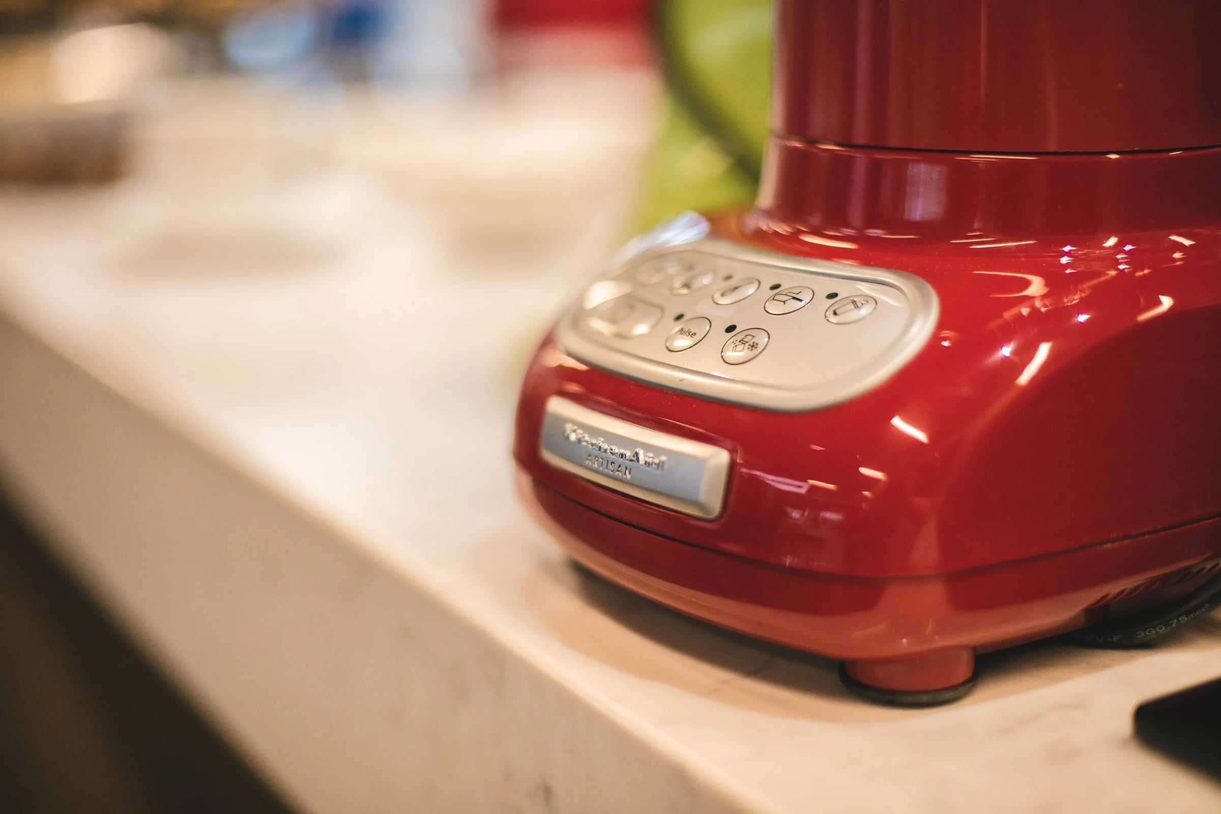 Control panel on a red KitchenAid appliance during the workshop