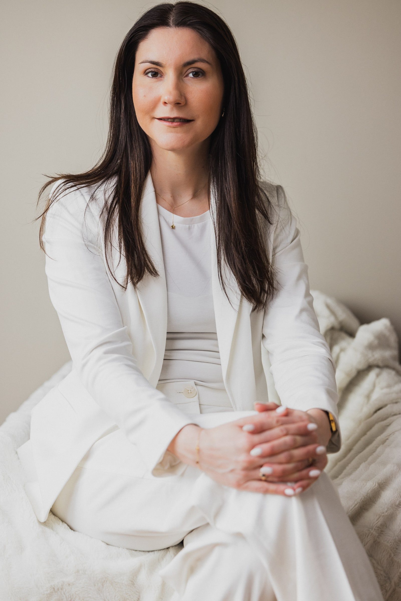 Professional portrait of a business coach in a light interior.